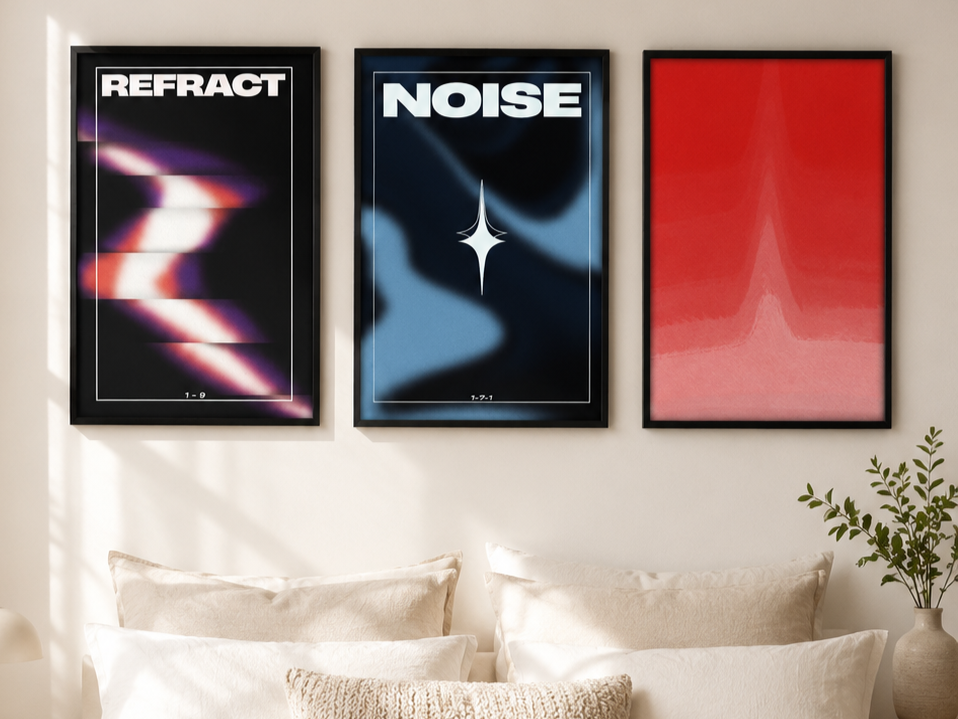 Modern gallery wall arrangement with framed art prints in a neutral interior